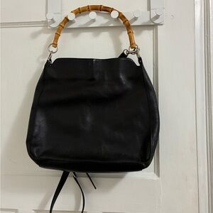 Elegant Black Leather Handbag with Bamboo Handle